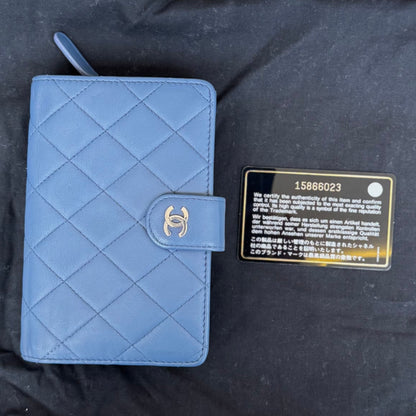 CHANEL Lambskin Quilted Zipped Pocket Wallet Lavander