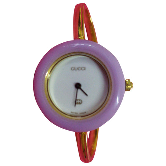 Gucci gold steel watch