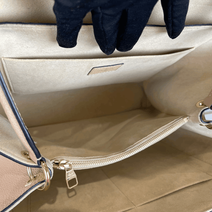 Louis-Vuitton Empreinte Leather Trocadero Bag in Dune