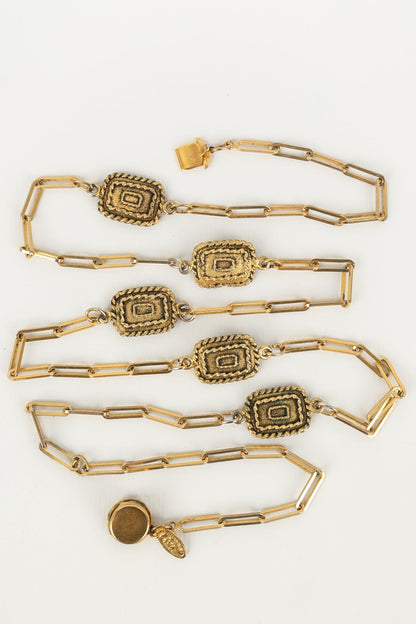 Collier doré Chanel 1984