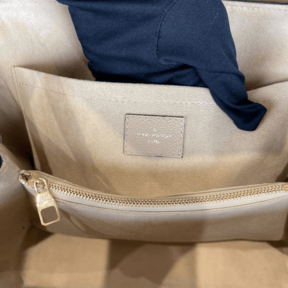Louis-Vuitton Empreinte Leather Trocadero Bag in Dune