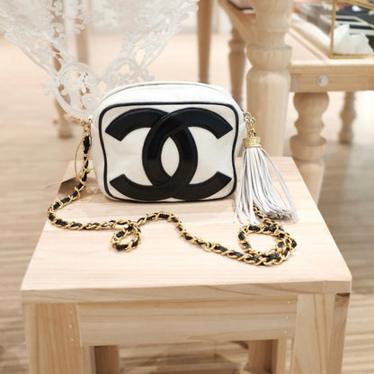 Chanel vintage CC camera crossbody bag with tassel