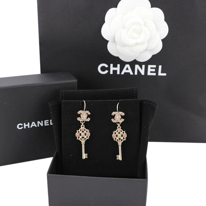 Dangling CC Key Piercing Earrings