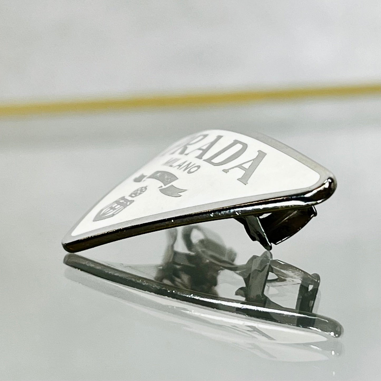 Prada White Silver Metal Enamel Triangle Logo Hair Clip