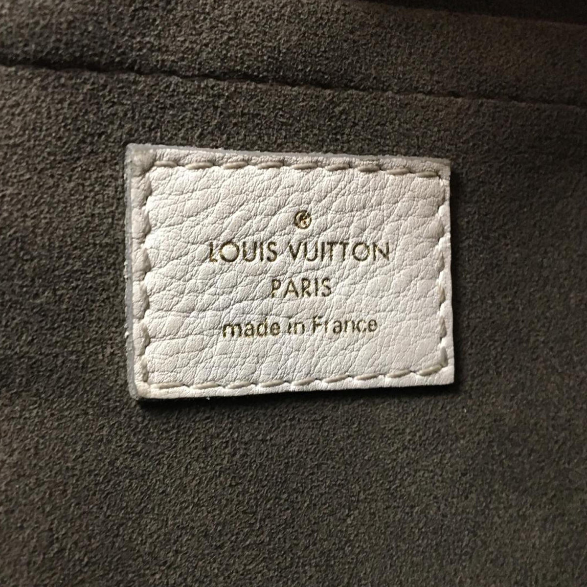 Louis-Vuitton Mahina Solar PM White