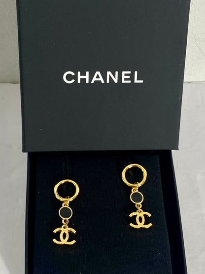 CHANEL GOLD TONE BLACK ENAMEL DANGLE EARRINGS