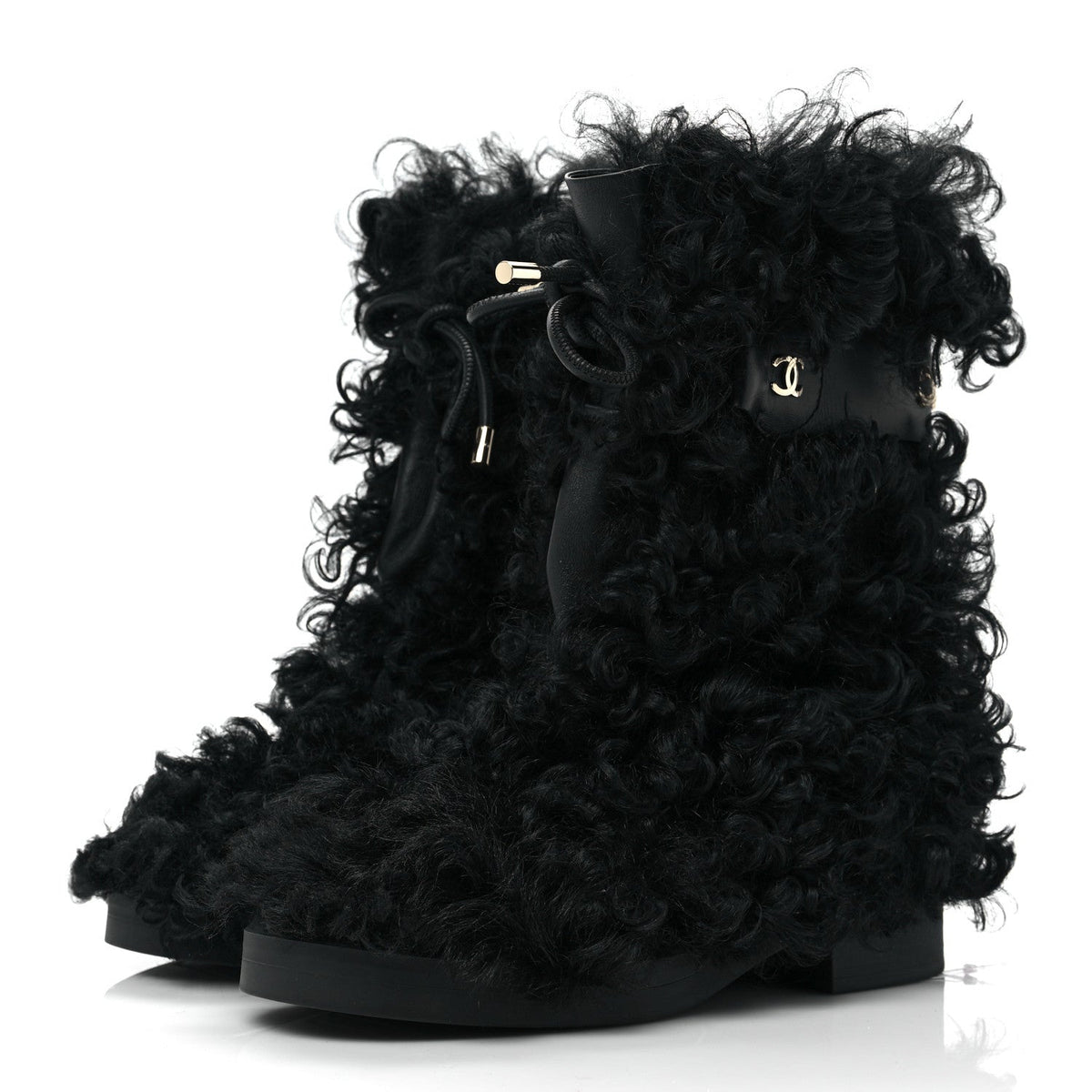 CHANEL INTERLOCKING CC LOGO SHEARLING BOOTS