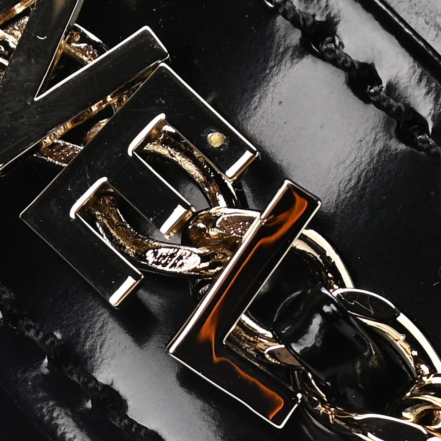 CHANEL SHINY PATENT CALFSKIN LOGO LOAFERS