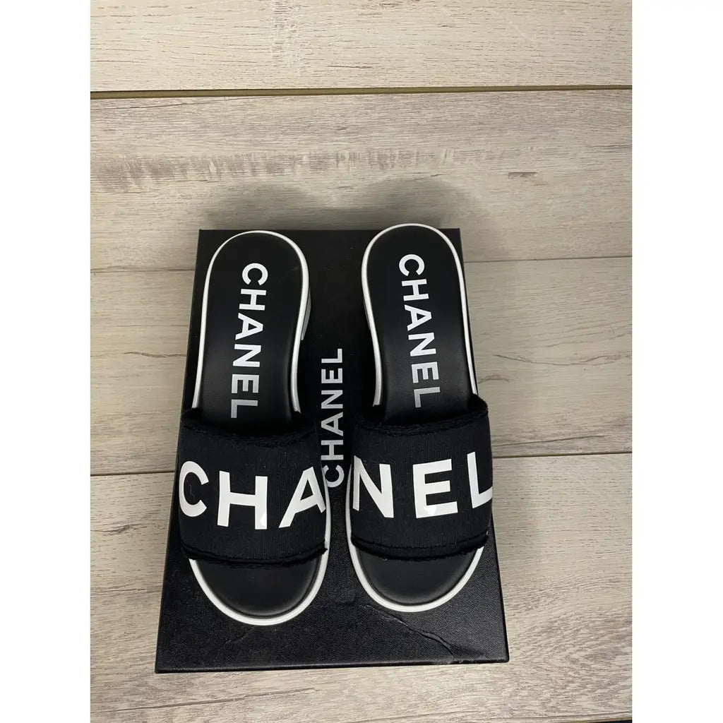 CHANEL LAMBSKIN CHA-NEL SANDLAS MULES