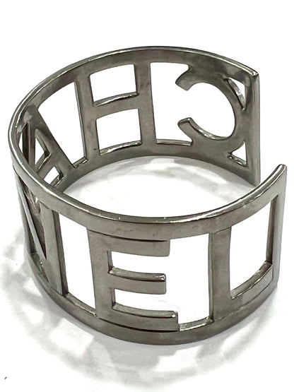 CHANEL METAL LOGO CUFF BRACELET