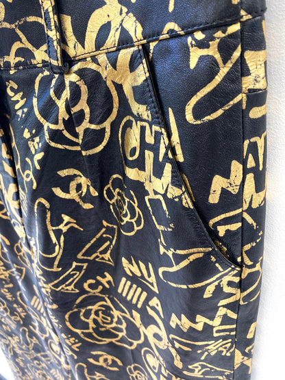 CHANEL CC ALLOVER LOGO LEATHER TROUSERS