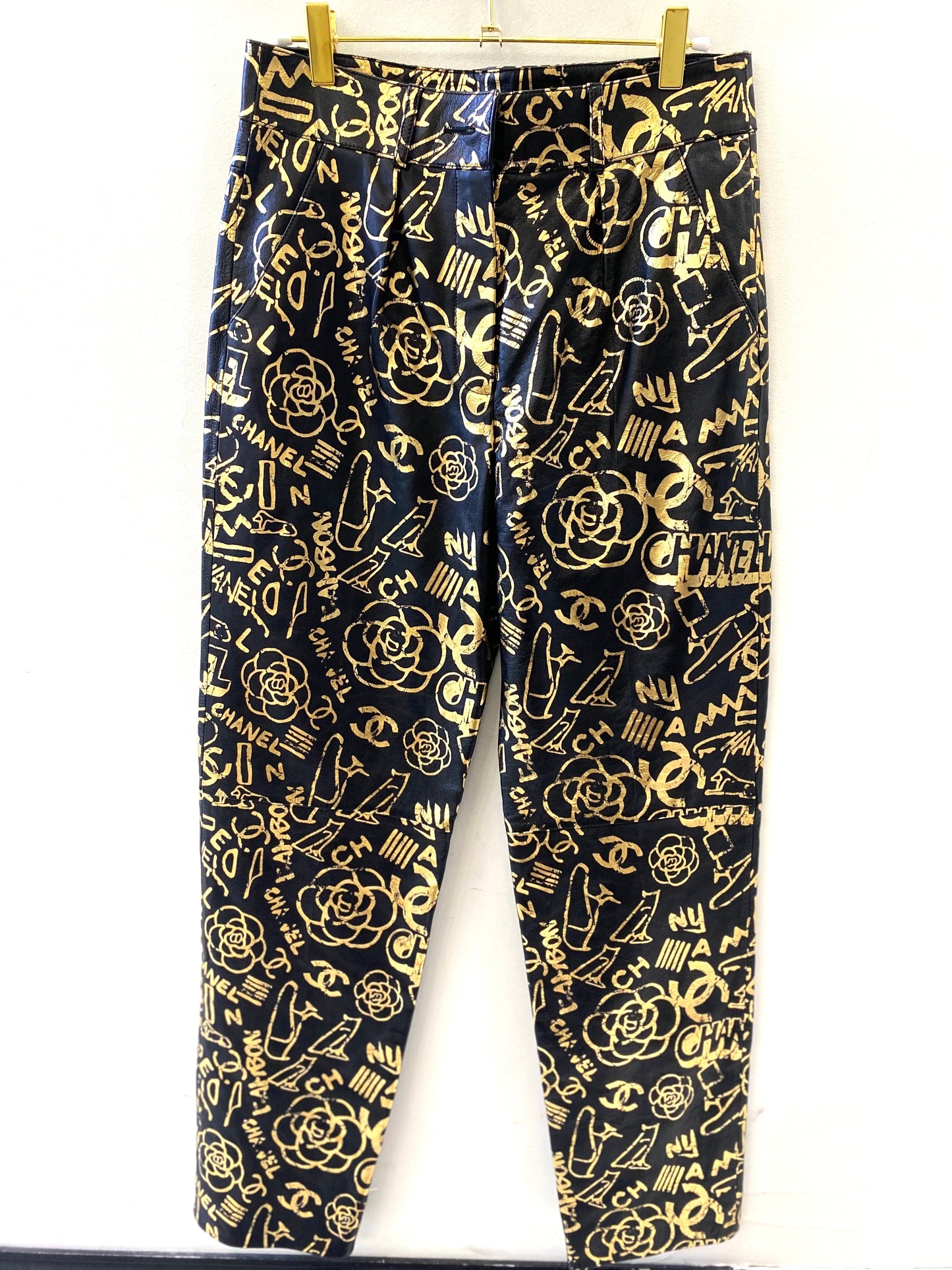 CHANEL CC ALLOVER LOGO LEATHER TROUSERS