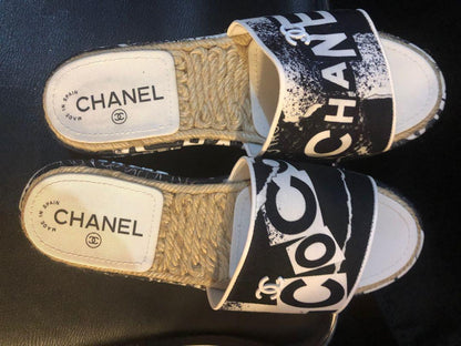 CHANEL COCO SIGNATURE PRINTED PLATFORM MULE SLIDES