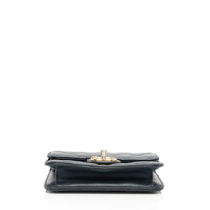 Chanel Lambskin Crossing Times Mini Flap Bag (SHF-Tv2M1K)