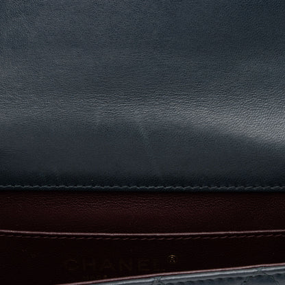 Chanel Lambskin Crossing Times Mini Flap Bag (SHF-Tv2M1K)