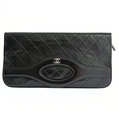 Chanel Clutch handbag in matelasse black leather