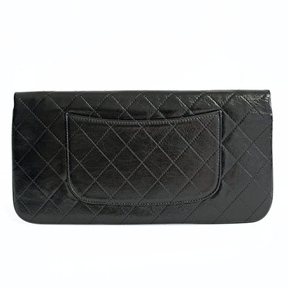 Chanel Clutch handbag in matelasse black leather