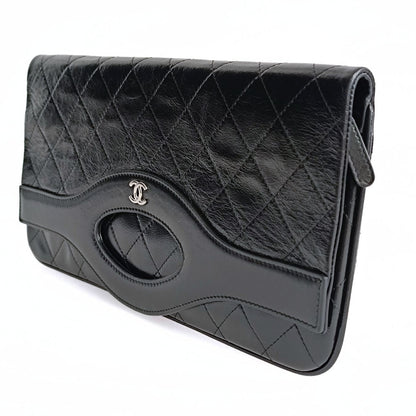 Chanel Clutch handbag in matelasse black leather