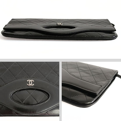 Chanel Clutch handbag in matelasse black leather