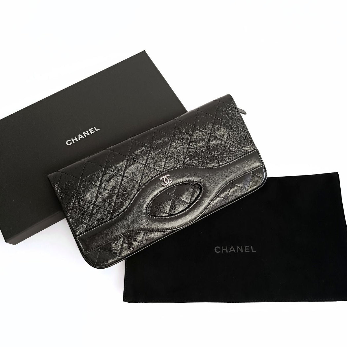 Chanel Chanel Clutch handbag in matelassé black leather - '10s