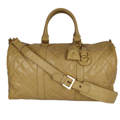 Chanel Chanel Chanel quilted travel bag in beige patent leather