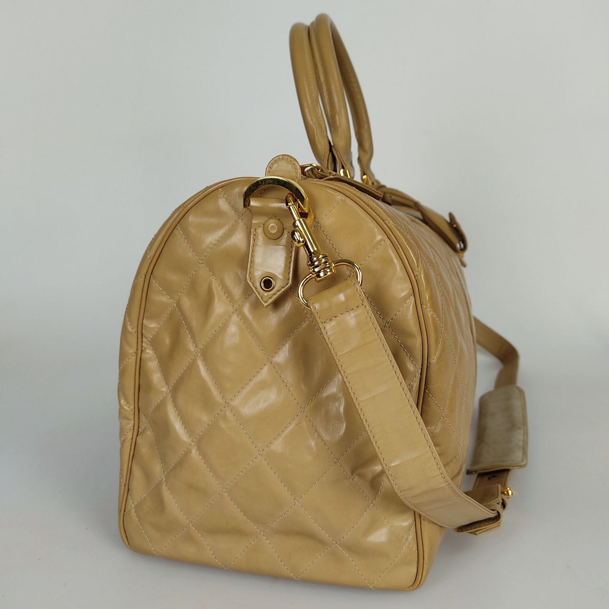 Chanel Chanel Chanel quilted travel bag in beige patent leather