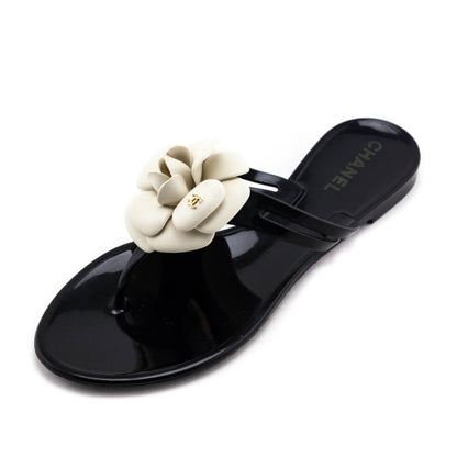 Chanel Black & Ivory Camellia Jelly Sandals Size US 8 | EU 38