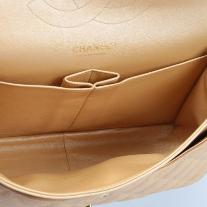 CHANEL Jumbo Quilted Double Flap Caviar Beige Iridescent