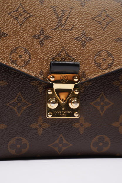Louis Vuitton Womens Pochette Metis Reverse Monogram