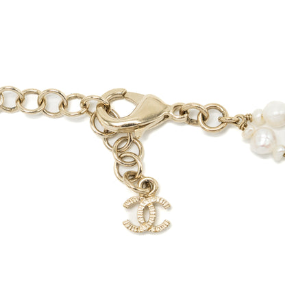 Chanel detailed letter checker blue / light gold tone