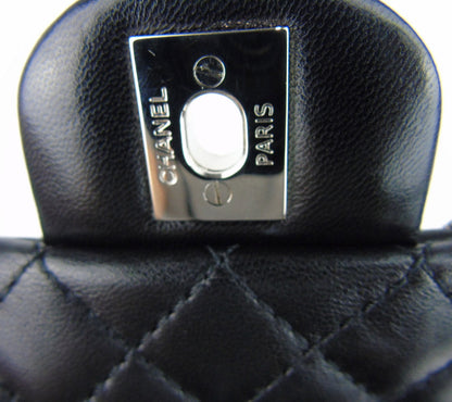 CHANEL 'Follies' black flap bag