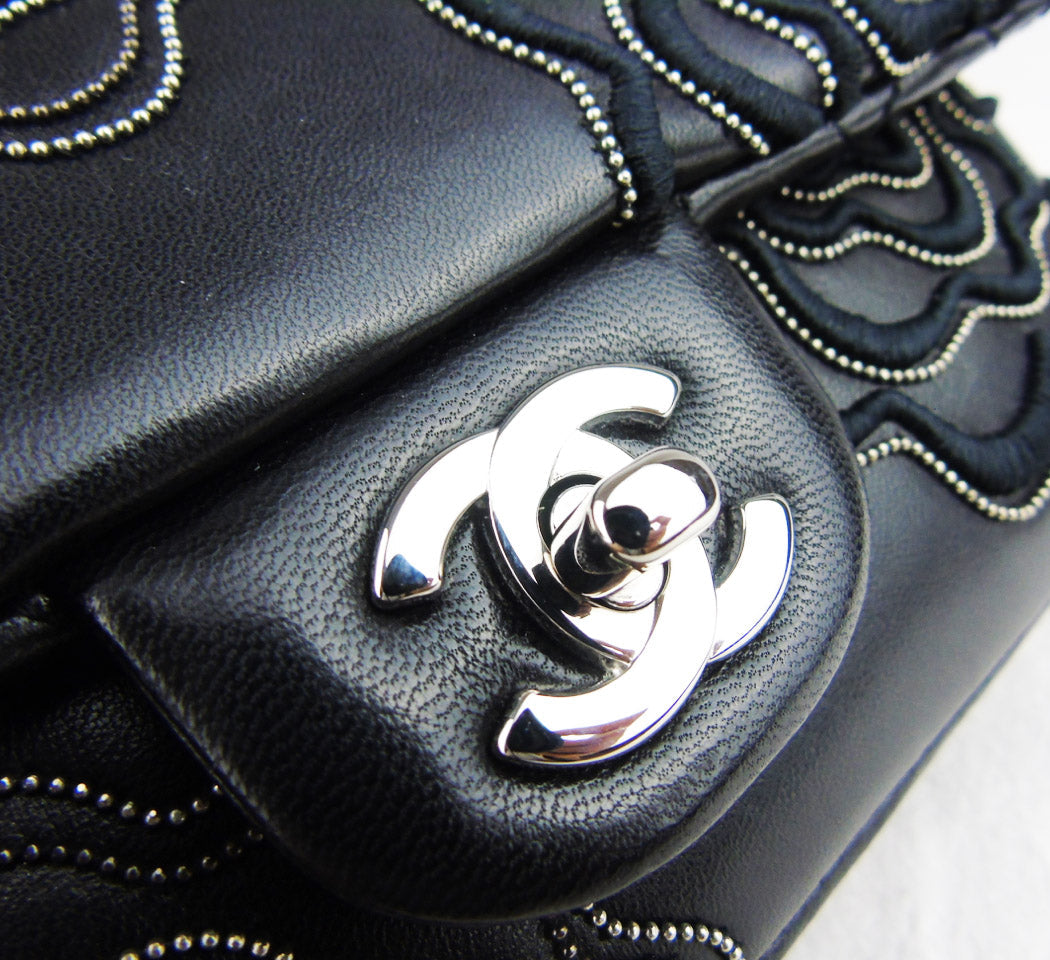 CHANEL 'Follies' black flap bag