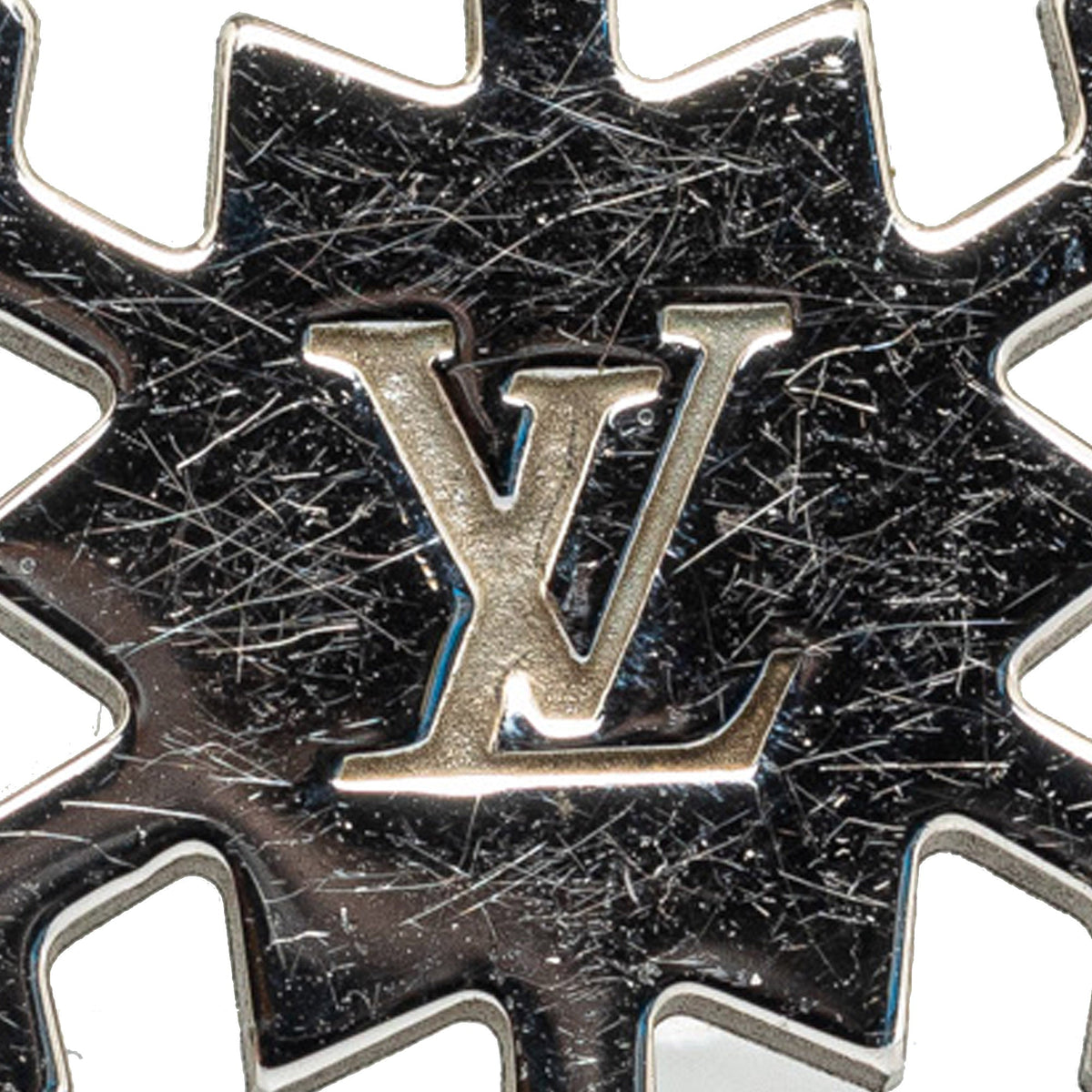 Silver Louis Vuitton Snowflake Brooch