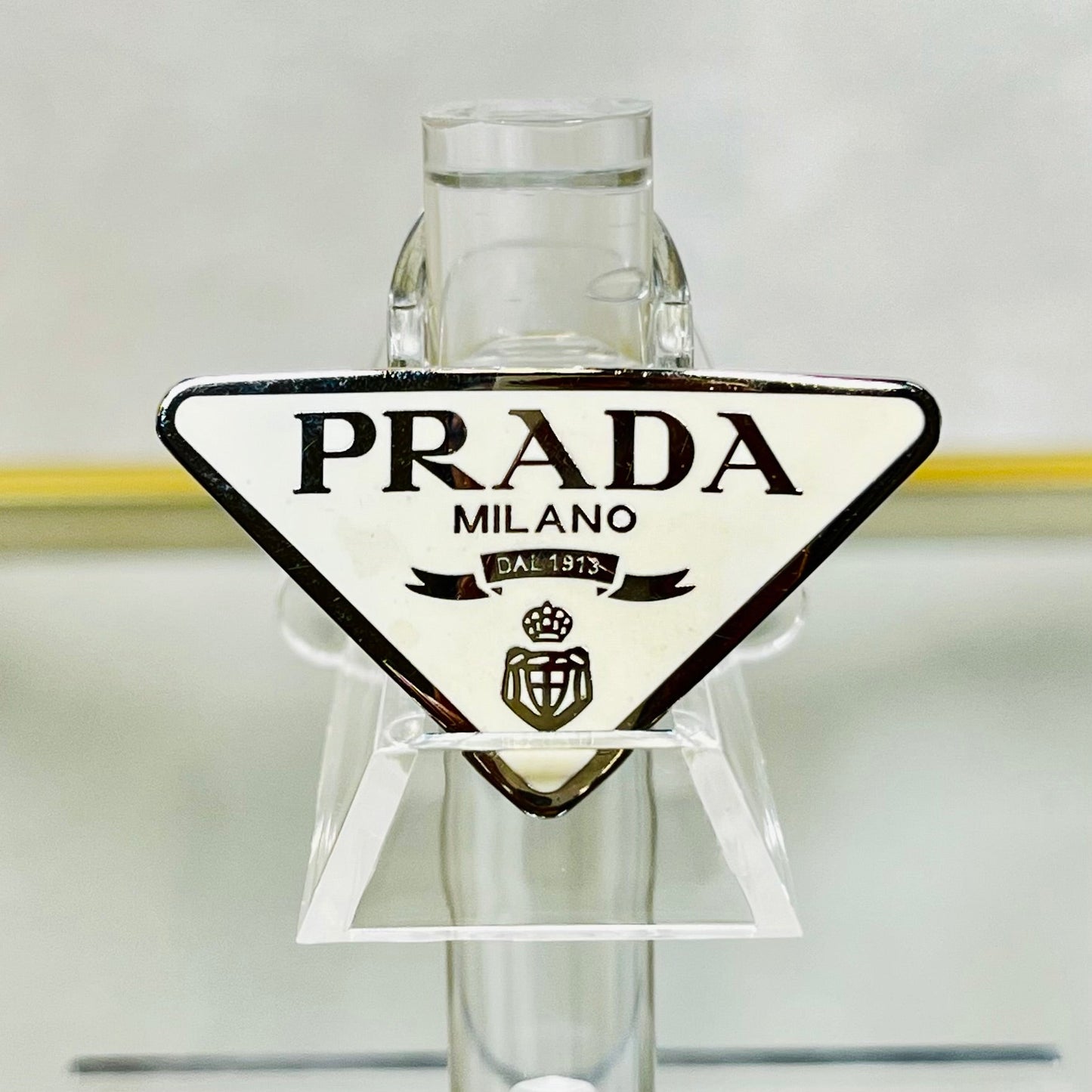 Prada White Silver Metal Enamel Triangle Logo Hair Clip