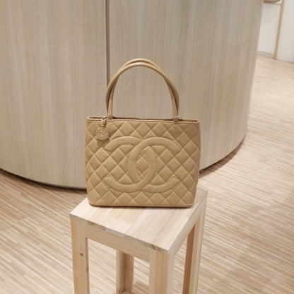 Chanel vintage medallion beige tote bag