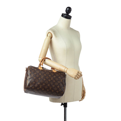 Louis-Vuitton Monogram Speedy Bandouliere 30 Brown