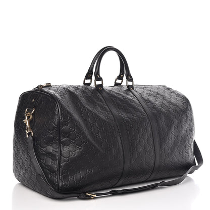 GUCCI GUCCISSIMA BLACK EMBOSSED LEATHER DUFFLE BAG