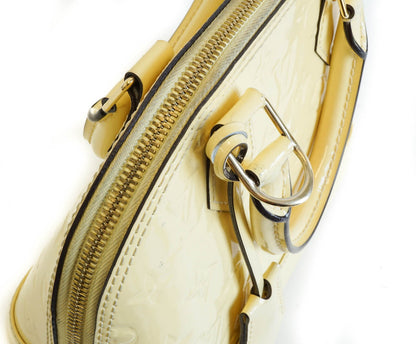 Louis-Vuitton Alma BB in Jaune Pale