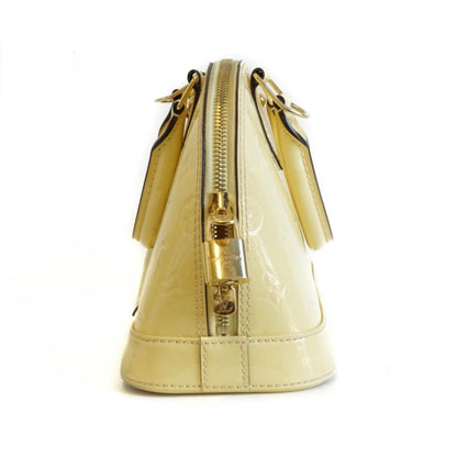 Louis-Vuitton Alma BB in Jaune Pale