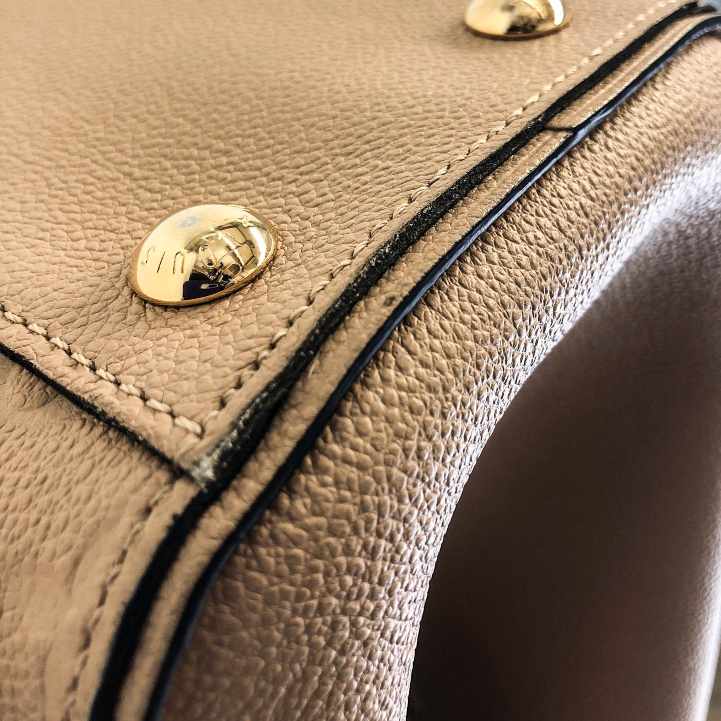 Louis-Vuitton Empreinte Leather Trocadero Bag in Dune