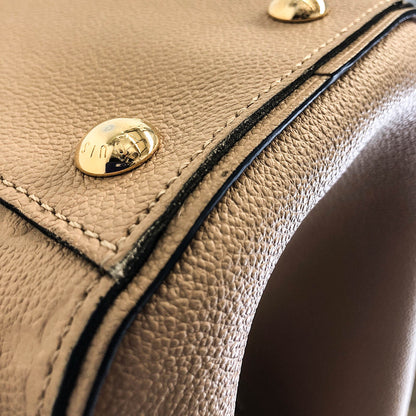 Louis-Vuitton Empreinte Leather Trocadero Bag in Dune
