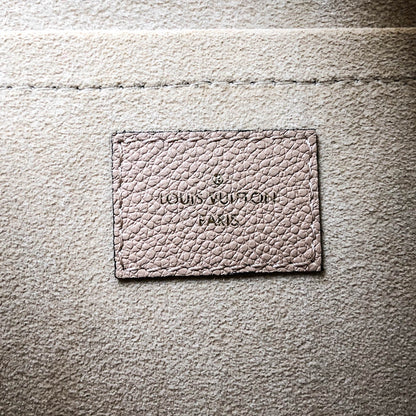 Louis-Vuitton Empreinte Leather Trocadero Bag in Dune