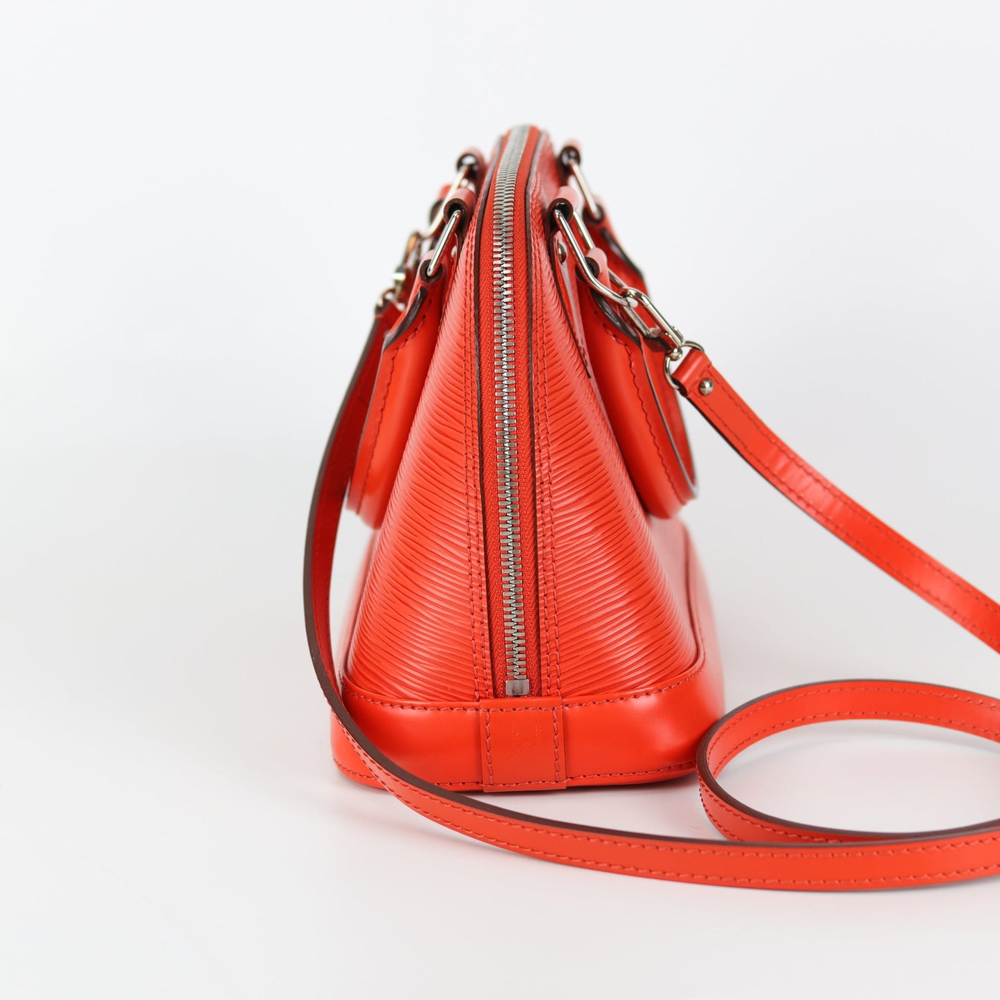 Louis-Vuitton Alma BB Epi Leather in Orange