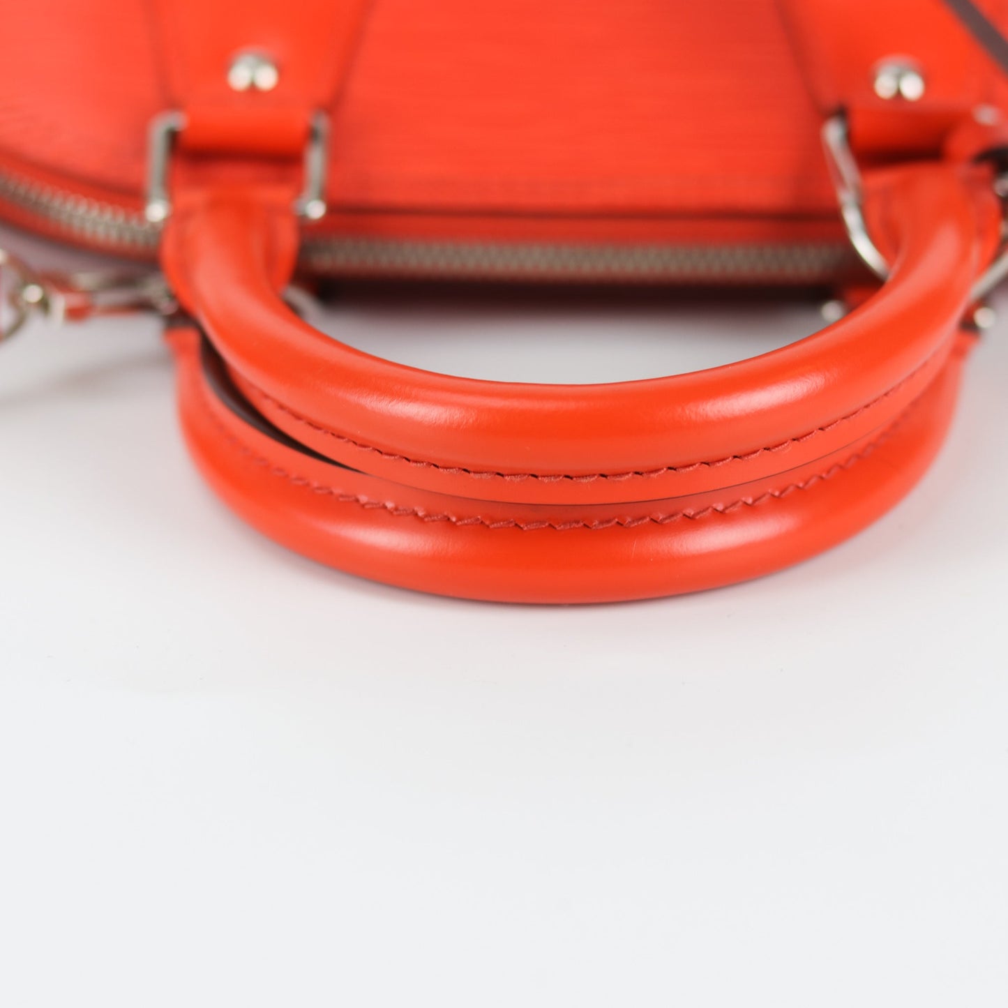 Louis-Vuitton Alma BB Epi Leather in Orange