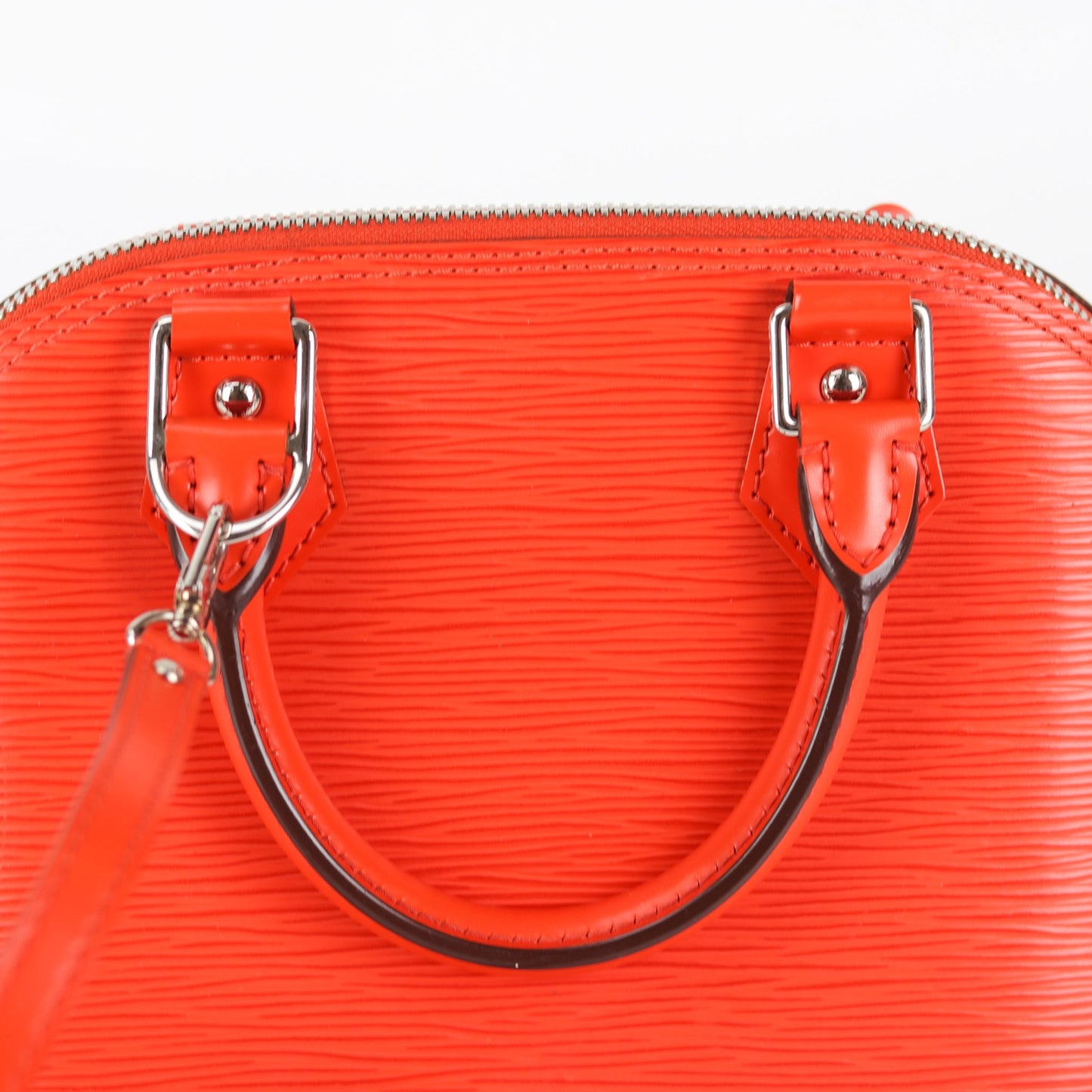 Louis-Vuitton Alma BB Epi Leather in Orange