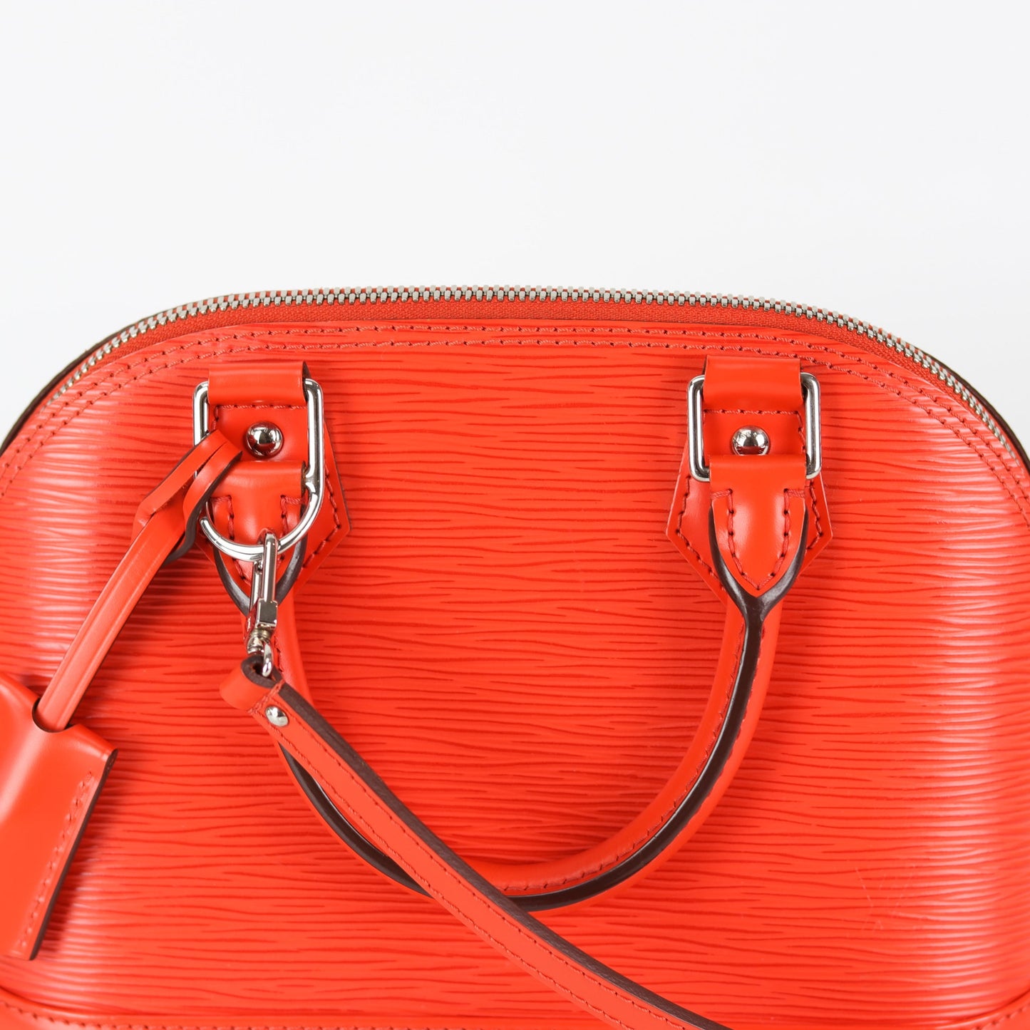Louis-Vuitton Alma BB Epi Leather in Orange