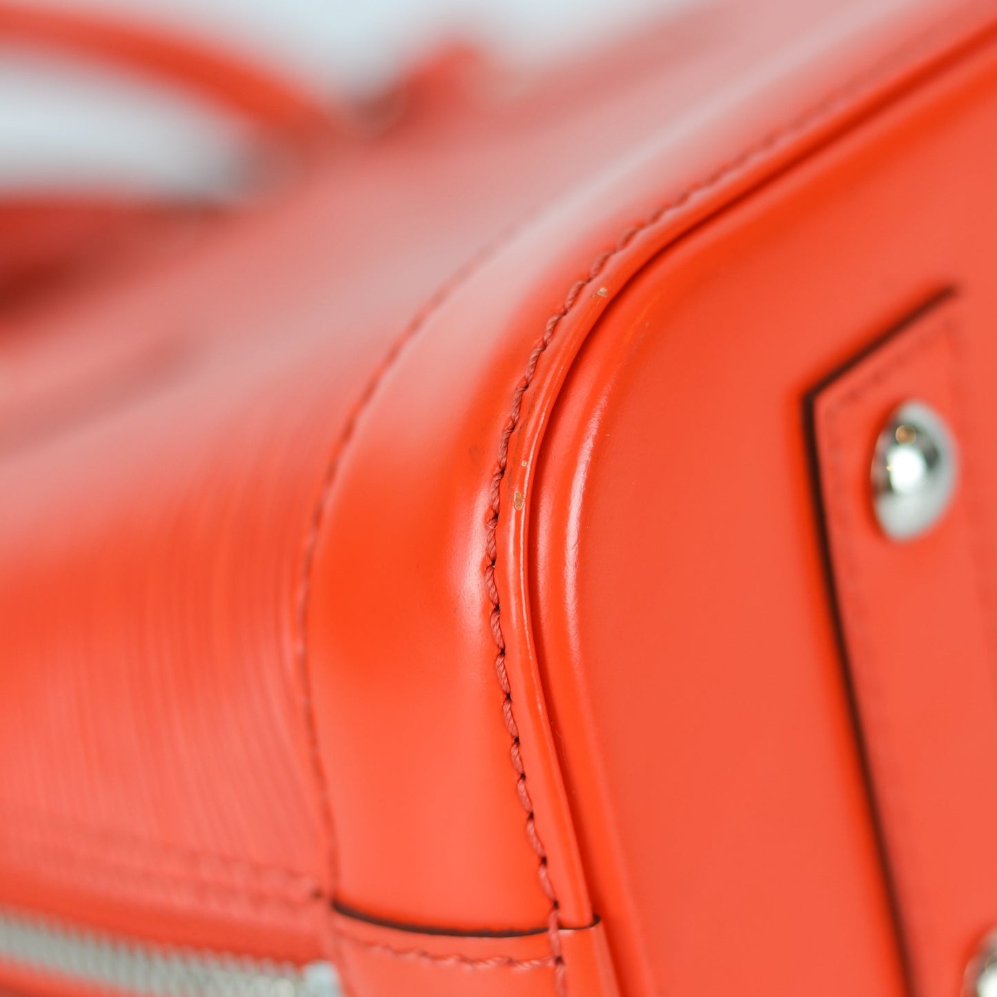 Louis-Vuitton Alma BB Epi Leather in Orange