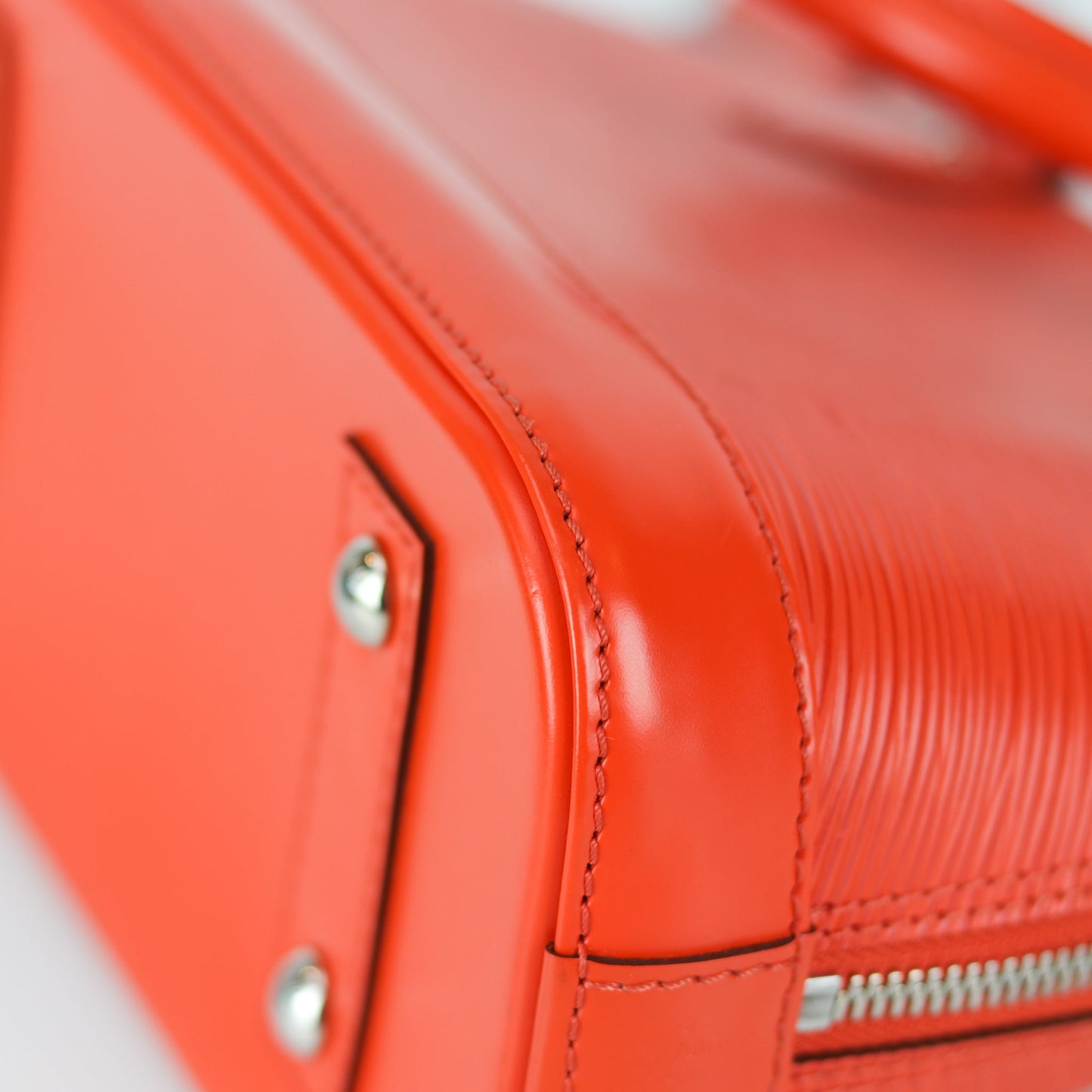 Louis-Vuitton Alma BB Epi Leather in Orange