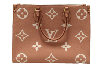 Louis Vuitton Pink Monogram Empreinte Cowhide Leather OnTheGo MM Bag