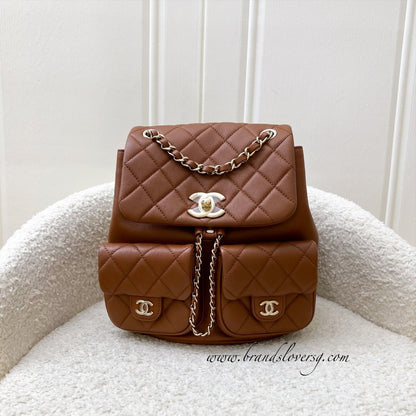 Chanel Medium Triple Backpack in 23A Cognac Brown Calfskin and LGHW (Model: AS3860)